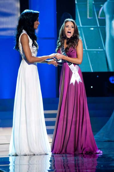 Maryland`s Nana Meriwether looks on as Rhode Island`s Olivia Culpo reacts to winning Miss USA 2012