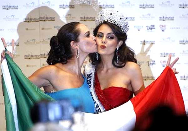 Two Mexican Miss Universes: Lupita Jones, Miss Universe 1991 and national director for Mexico kisses the new Miss Universe 2010, Ximena Navarrete