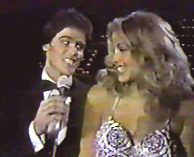 Donny Osmond serenades Miss USA 1980, Jineane Ford of Arizona during the 1980 Miss USA pageant